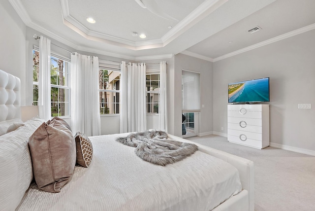 171 Tresana Blvd Unit 129, Jupiter, FL 33478 - carpeted bedroom featuring crown molding, a tray ceiling, and recessed lighting