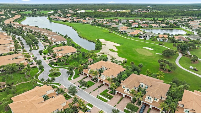 171 Tresana Blvd Unit 129, Jupiter, FL 33478 - aerial perspective of suburban area featuring a large body of water and a golf course