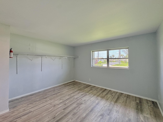 2885 Crosley Dr E Unit F, West Palm Beach, FL 33415 - empty room with wood finished floors