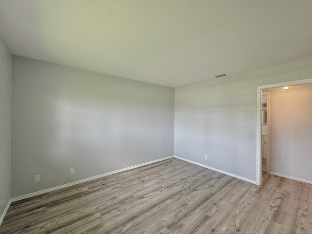 2885 Crosley Dr E Unit F, West Palm Beach, FL 33415 - empty room featuring wood finished floors and baseboards