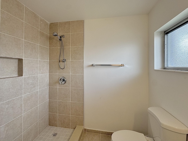 2885 Crosley Dr E Unit F, West Palm Beach, FL 33415 - bathroom featuring a tile shower and tile patterned flooring