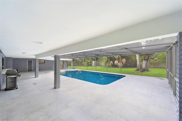 6532 Serena Ln, Boca Raton, FL 33433 - view of pool featuring area for grilling, a patio, a fenced backyard, and glass enclosure