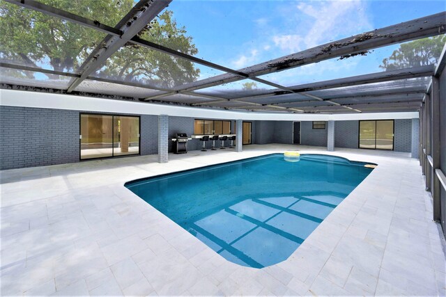6532 Serena Ln, Boca Raton, FL 33433 - swimming pool featuring a patio area, grilling area, and a lanai