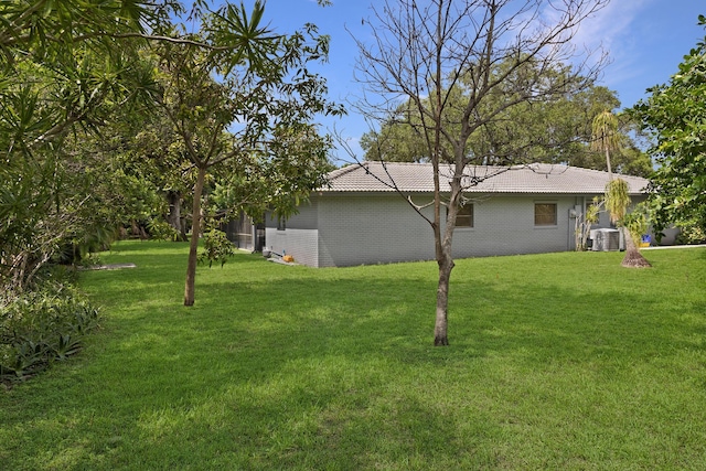 6532 Serena Ln, Boca Raton, FL 33433 - view of side of home with a yard and a tile roof