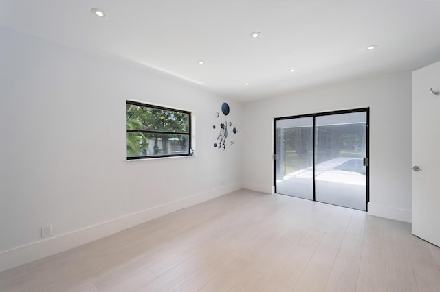 6532 Serena Ln, Boca Raton, FL 33433 - spare room featuring recessed lighting and light wood-style flooring