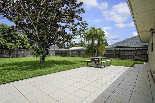 3126 SW Curcuma St, Port Saint Lucie, FL 34953 - fenced backyard featuring a patio area