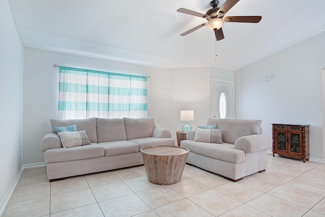 3126 SW Curcuma St, Port Saint Lucie, FL 34953 - living room with a ceiling fan, light tile patterned floors, and a textured ceiling