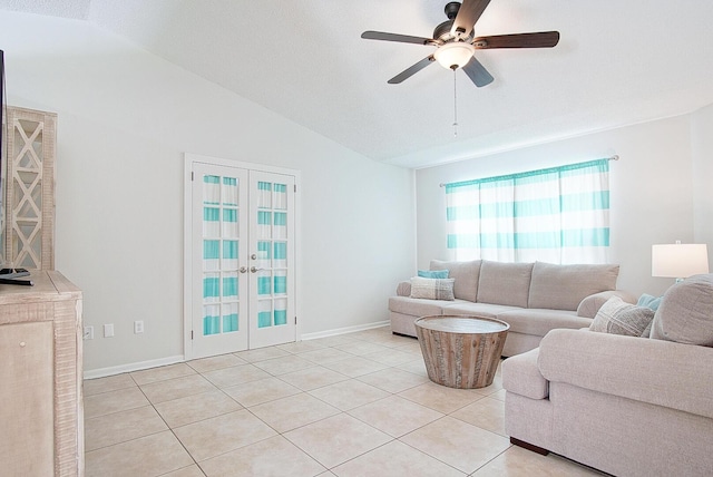 3126 SW Curcuma St, Port Saint Lucie, FL 34953 - living area with vaulted ceiling, ceiling fan, light tile patterned floors, and french doors