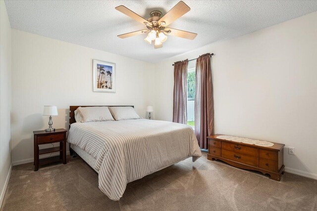 516 SW Crawfish Dr, Port Saint Lucie, FL 34953 - bedroom featuring carpet flooring and a ceiling fan