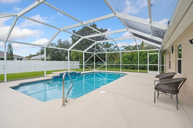 516 SW Crawfish Dr, Port Saint Lucie, FL 34953 - view of swimming pool featuring a patio