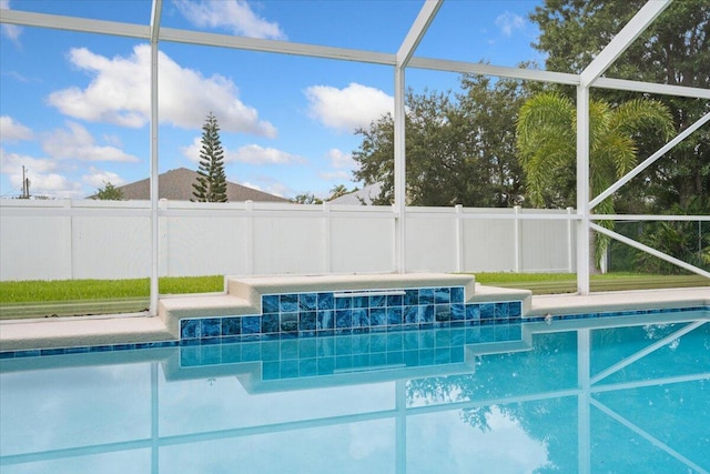516 SW Crawfish Dr, Port Saint Lucie, FL 34953 - view of swimming pool featuring a lanai and a jacuzzi