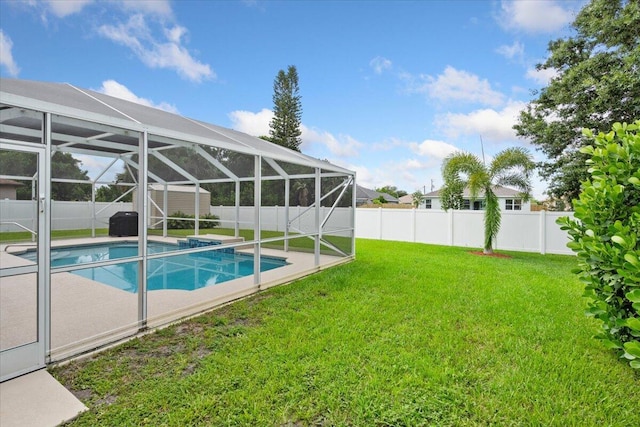 516 SW Crawfish Dr, Port Saint Lucie, FL 34953 - view of swimming pool with a fenced backyard and a lanai