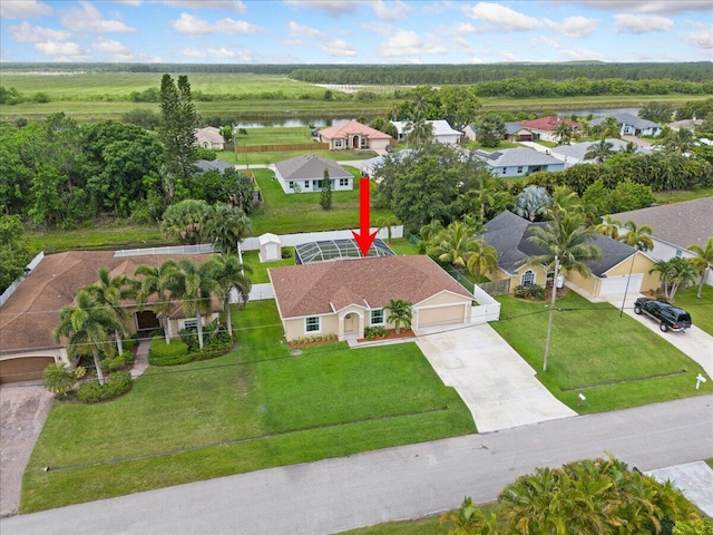 516 SW Crawfish Dr, Port Saint Lucie, FL 34953 - aerial view of residential area with a large body of water