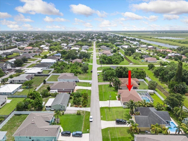 516 SW Crawfish Dr, Port Saint Lucie, FL 34953 - aerial view of residential area featuring a large body of water