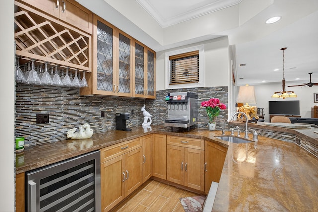 11085 86th St N, Palm Beach Gardens, FL 33412 - indoor bar featuring wine cooler, tasteful backsplash, crown molding, light wood-type flooring, and recessed lighting
