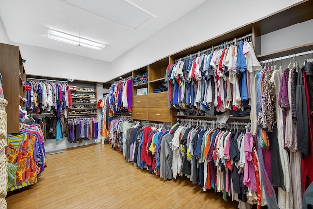 11085 86th St N, Palm Beach Gardens, FL 33412 - walk in closet featuring wood finished floors