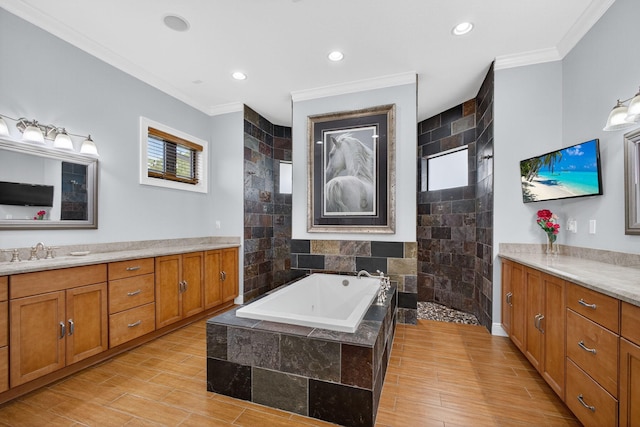 11085 86th St N, Palm Beach Gardens, FL 33412 - full bathroom featuring crown molding, vanity, a garden tub, walk in shower, and wood finished floors