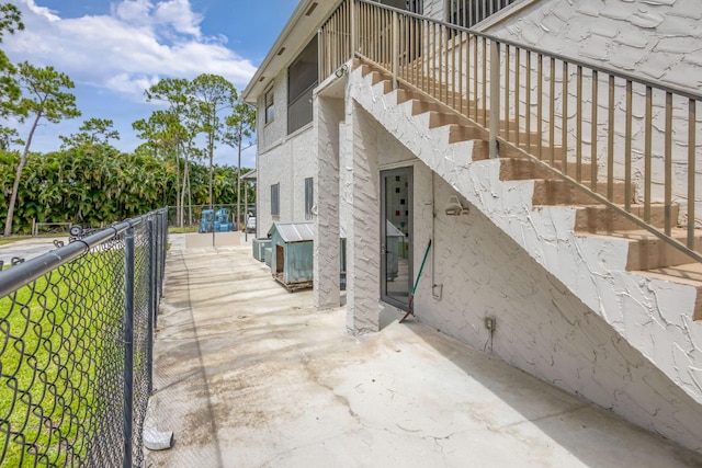 11085 86th St N, Palm Beach Gardens, FL 33412 - view of patio / terrace with stairway
