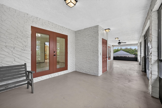 11085 86th St N, Palm Beach Gardens, FL 33412 - property entrance featuring french doors and stucco siding