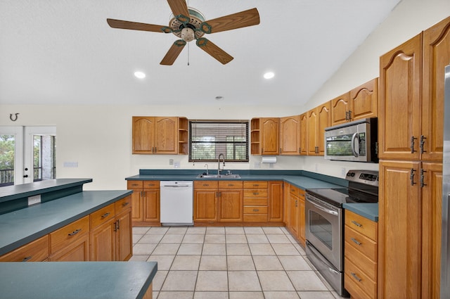11085 86th St N, Palm Beach Gardens, FL 33412 - kitchen featuring stainless steel appliances, dark countertops, open shelves, healthy amount of natural light, and vaulted ceiling