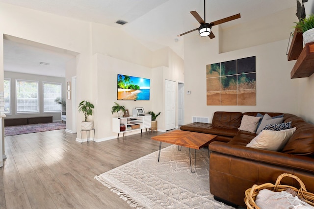 6351 Adams St, Jupiter, FL 33458 - living room with wood finished floors, a ceiling fan, and a high ceiling