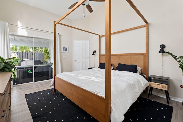 6351 Adams St, Jupiter, FL 33458 - bedroom featuring wood finished floors and a ceiling fan