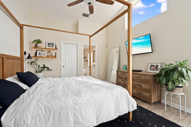 6351 Adams St, Jupiter, FL 33458 - bedroom featuring light wood-style floors, ceiling fan, ensuite bath, and a high ceiling