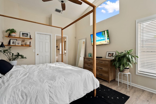 6351 Adams St, Jupiter, FL 33458 - bedroom featuring high vaulted ceiling, light wood-style floors, ensuite bath, and a ceiling fan