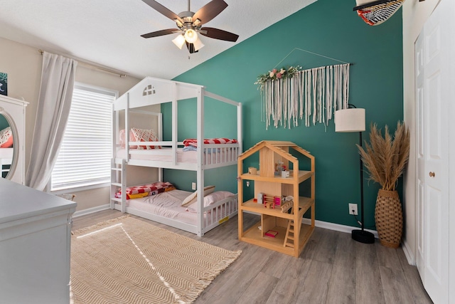 6351 Adams St, Jupiter, FL 33458 - bedroom featuring wood finished floors and lofted ceiling