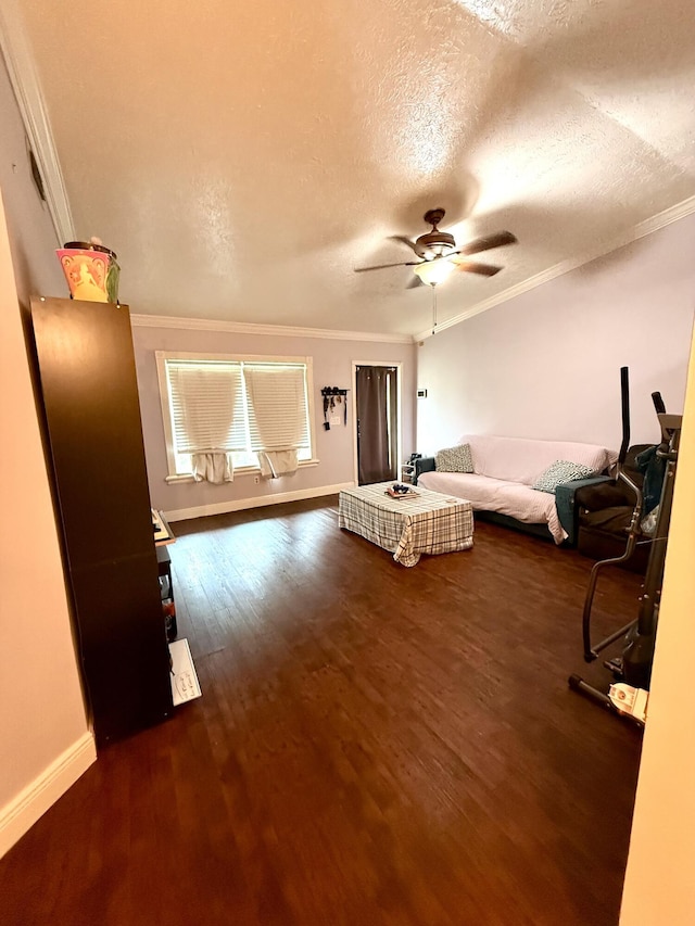 1114 SW Del Rio Blvd, Port Saint Lucie, FL 34953 - bedroom featuring wood finished floors, crown molding, a textured ceiling, and a ceiling fan