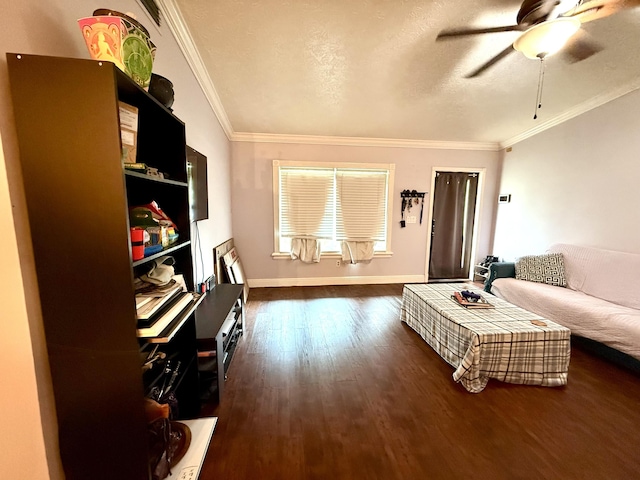 1114 SW Del Rio Blvd, Port Saint Lucie, FL 34953 - living area featuring dark wood-type flooring, crown molding, a ceiling fan, and a textured ceiling