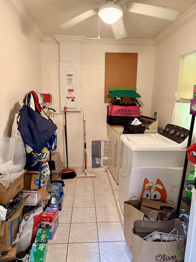 1114 SW Del Rio Blvd, Port Saint Lucie, FL 34953 - laundry area featuring washing machine and clothes dryer, crown molding, tile patterned floors, and ceiling fan