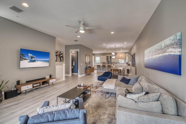 5178 Beckman Ter, Palm Beach Gardens, FL 33418 - living room with ceiling fan, wood finished floors, and recessed lighting