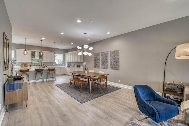 5178 Beckman Ter, Palm Beach Gardens, FL 33418 - dining space featuring light wood finished floors and recessed lighting