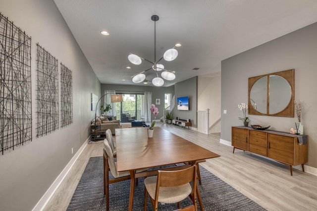 5178 Beckman Ter, Palm Beach Gardens, FL 33418 - dining space featuring light wood-style floors, recessed lighting, and a chandelier