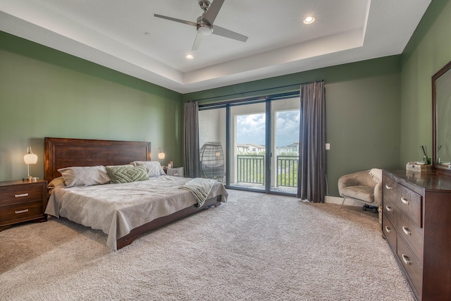 5178 Beckman Ter, Palm Beach Gardens, FL 33418 - carpeted bedroom with access to outside, a tray ceiling, recessed lighting, and a ceiling fan