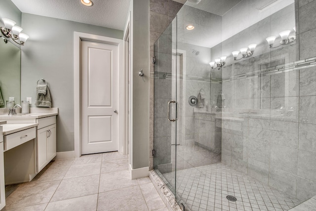 5178 Beckman Ter, Palm Beach Gardens, FL 33418 - full bath featuring vanity, a stall shower, tile patterned floors, a textured ceiling, and recessed lighting