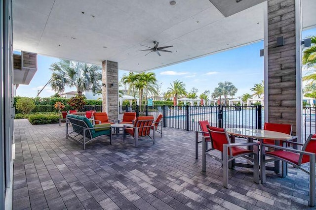 5178 Beckman Ter, Palm Beach Gardens, FL 33418 - view of patio featuring ceiling fan, an outdoor living space, a swimming pool, and outdoor dining space
