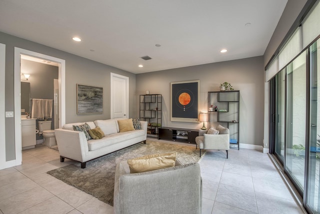 5178 Beckman Ter, Palm Beach Gardens, FL 33418 - living area with recessed lighting and light tile patterned floors