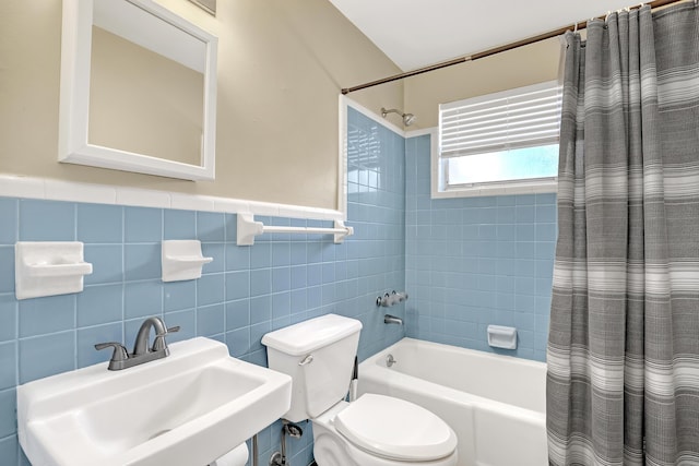 1395 SE Darling St, Stuart, FL 34997 - bathroom with shower / bath combination with curtain, tile walls, and wainscoting