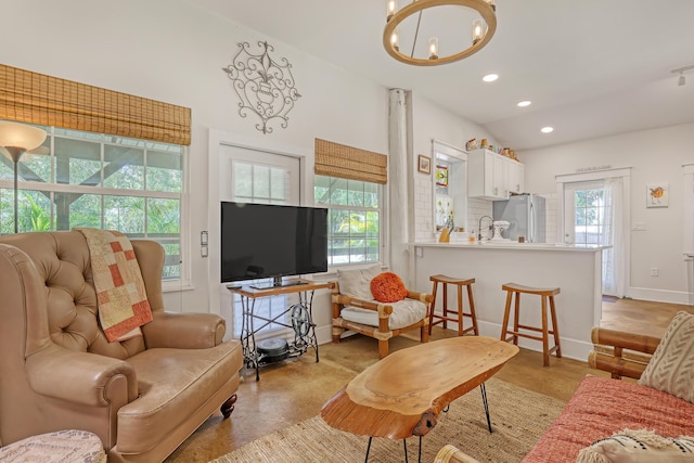 1395 SE Darling St, Stuart, FL 34997 - living area featuring a chandelier and recessed lighting