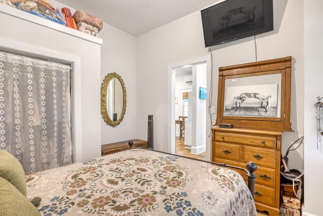 1395 SE Darling St, Stuart, FL 34997 - bedroom with baseboards and a wall mounted AC