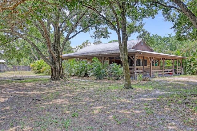 1395 SE Darling St, Stuart, FL 34997 - view of yard featuring an exterior structure