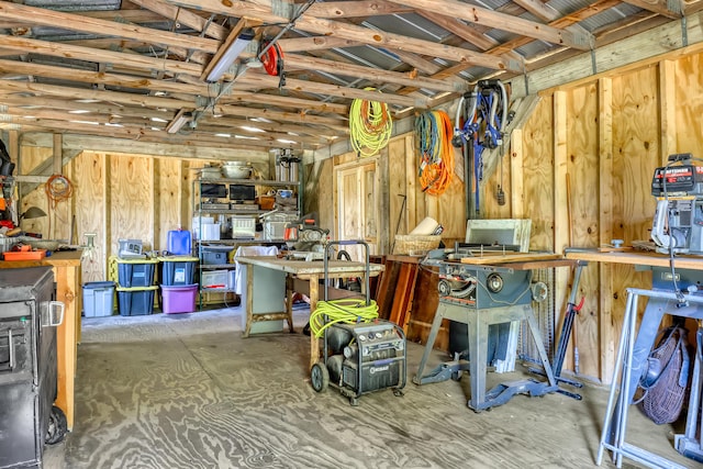 1395 SE Darling St, Stuart, FL 34997 - garage featuring a workshop area