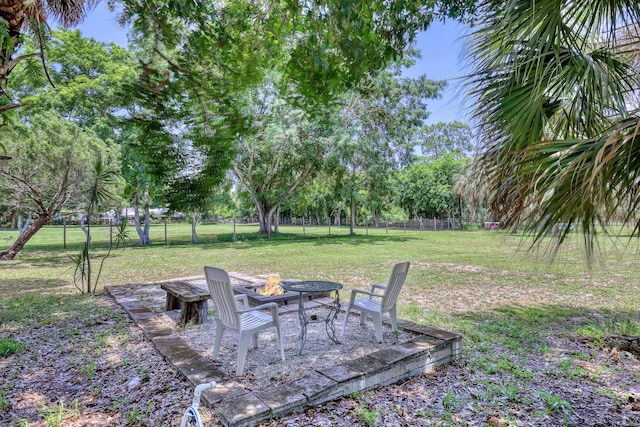 1395 SE Darling St, Stuart, FL 34997 - view of yard featuring a fire pit