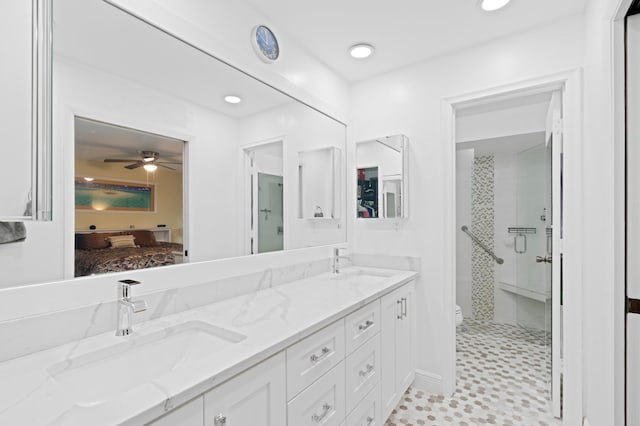 7980 Cloverfield Cir, Boca Raton, FL 33433 - ensuite bathroom featuring double vanity, a ceiling fan, and a shower