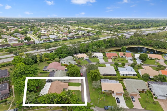 7980 Cloverfield Cir, Boca Raton, FL 33433 - aerial view of residential area featuring property boundaries highlighted and a nearby body of water