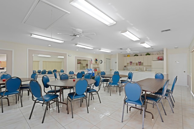 7980 Cloverfield Cir, Boca Raton, FL 33433 - dining room with attic access, ceiling fan, and light tile patterned floors