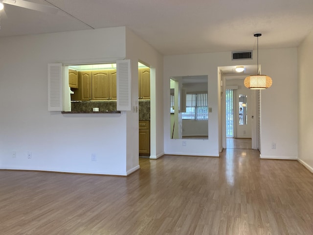 353 Mansfield I Unit 353I, Boca Raton, FL 33434 - unfurnished room with wood finished floors and a ceiling fan