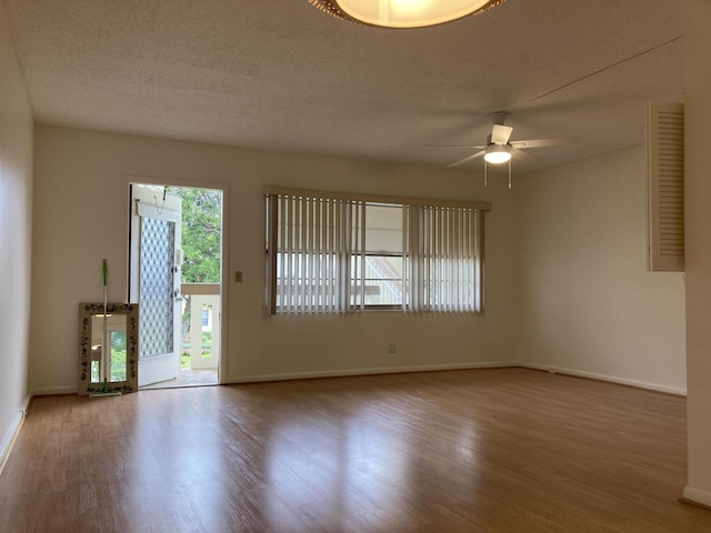 353 Mansfield I Unit 353I, Boca Raton, FL 33434 - unfurnished room with wood finished floors, ceiling fan, and a textured ceiling